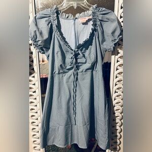 Showpo. Mini Polka Dotted Puff Sleeved Mini Dress with adjustable tie bust